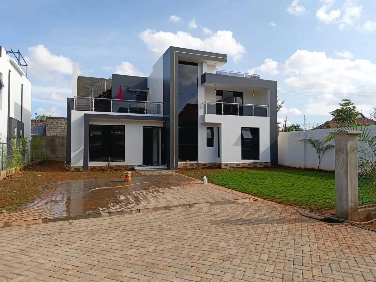 Completed family home with paved driveway