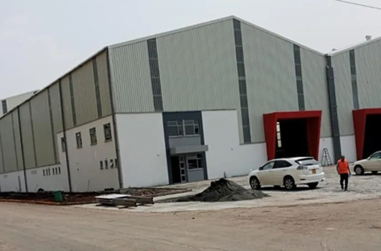 Steel warehouse building with loading doors